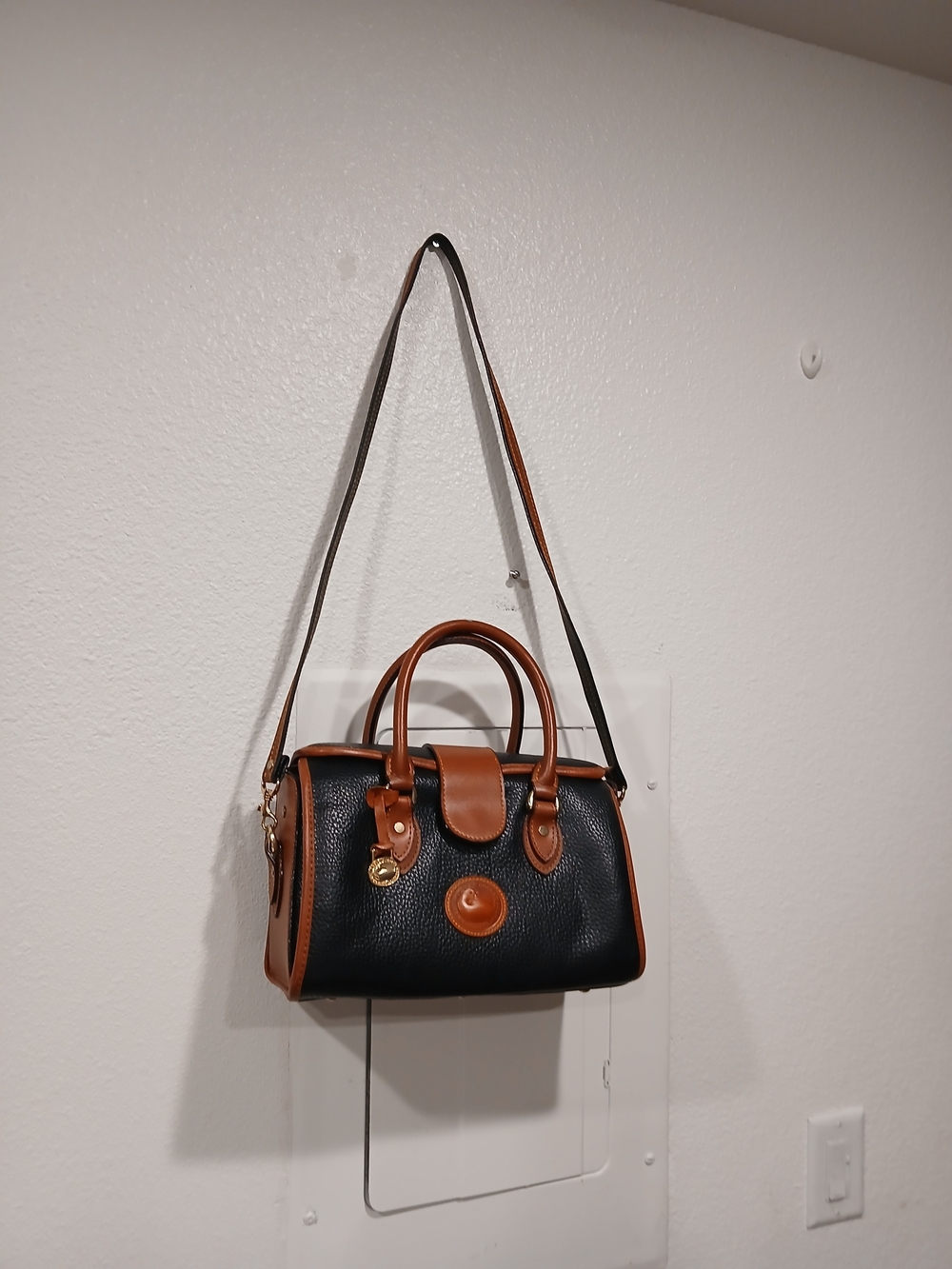Dooney & Bourke Black and Tan Pebbled Leather Satchel